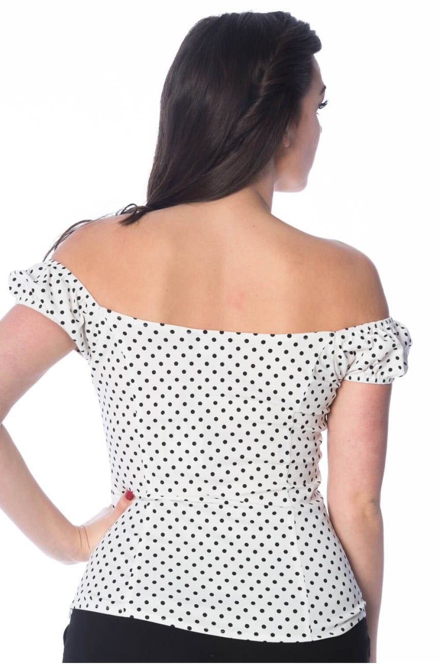 Haut a pois blanc et noir